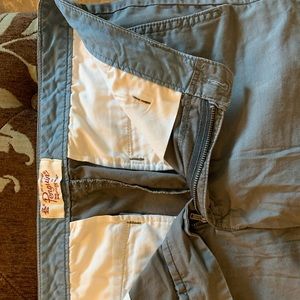 Penguin Munsingwear Flat Front Shorts Green in color